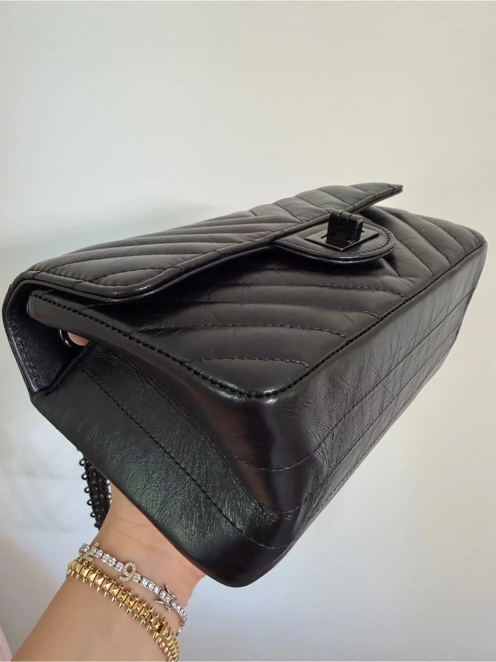 CHANEL SO BLACK REISSUE 2.55 FLAP CHEVRON AGED CALFSKIN MINI